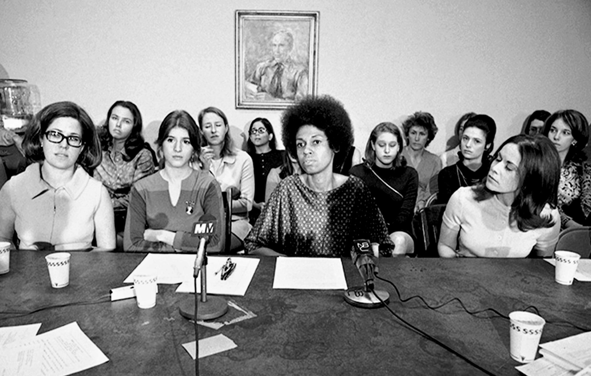 Forty-six female employees announce their lawsuit against Newsweek for gender discrimination under the 1964 Civil Rights Act. Eleanor Holmes Norton (front, center), a future U.S. representative, was their attorney.