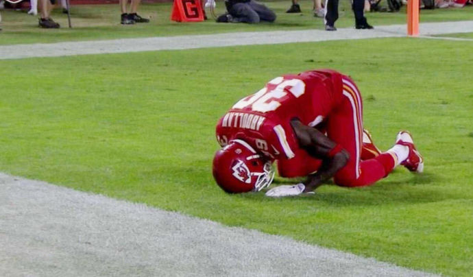 Husain Abdullah praying after his touchdown against New England Patriots

