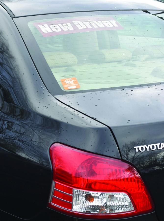 New driver stickers are asked to be displayed in the back window of vehicles so they are easily seen by other drivers