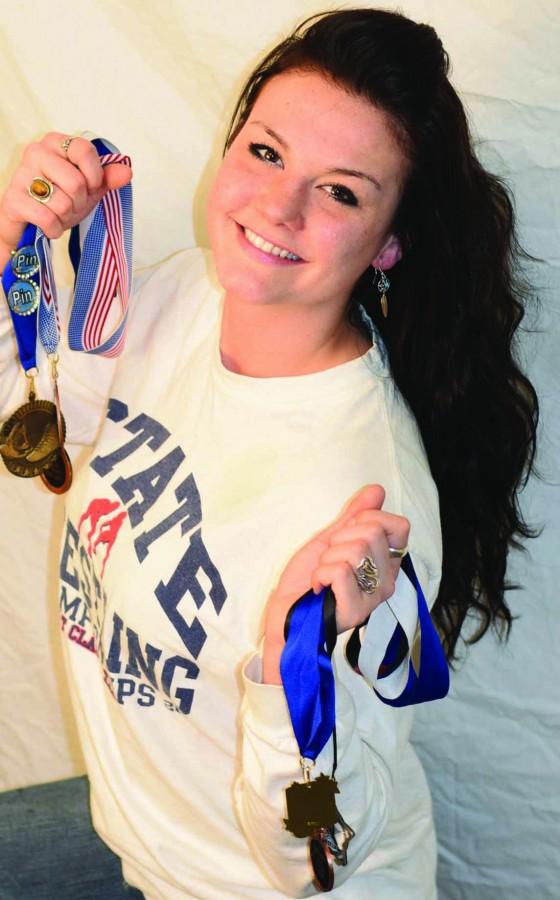 Desitiny Mangini has accumulated over fifteen medals as a competitive wrestler 