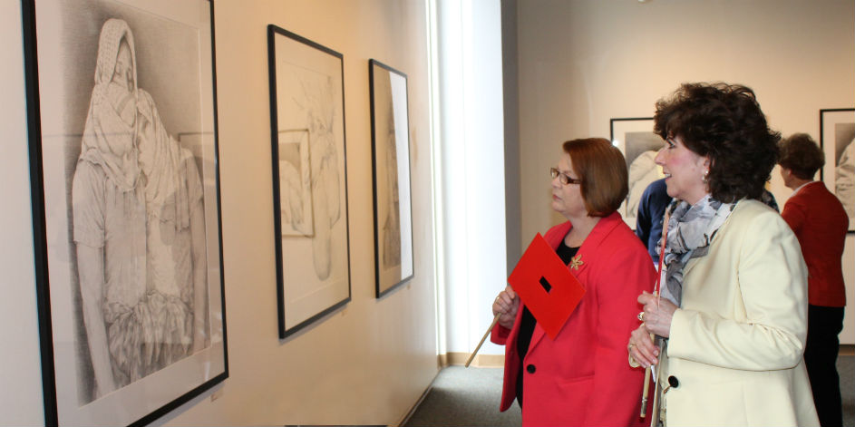 Denise Yochum and Cheryl Batschi admiring Geron’s work.