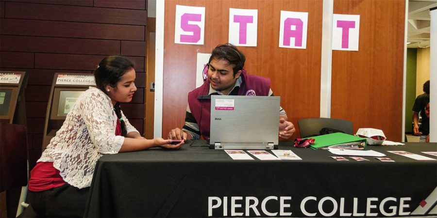 STAT member Krutharth Panchal helps passing students like Pravalia Gampala.