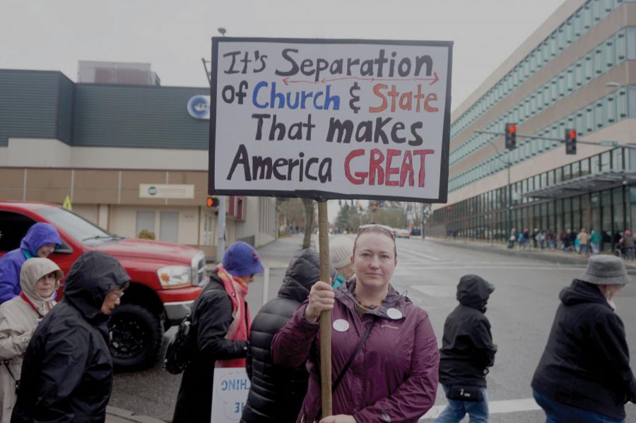 Protestor on the street with her sign 