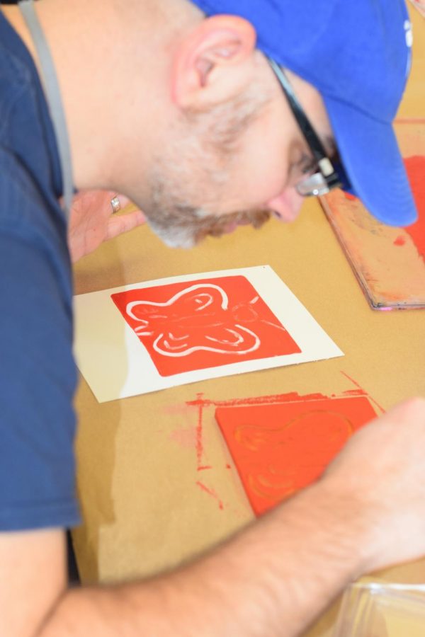 Cameron Cox, Student Life Program Director shows off his artistic talent