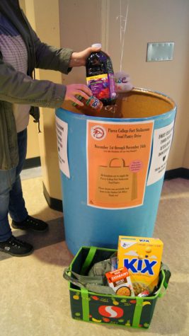 A student is shown donating to the food pantry.