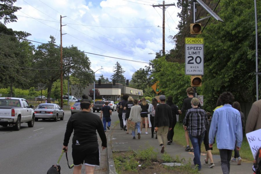 Protestors passing Custer Elementary.